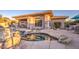 Stunning backyard oasis with a pool, spa, and covered patio at 7462 E Visao Dr, Scottsdale, AZ 85266