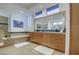 Elegant bathroom with double vanity, soaking tub, and walk-in shower at 7462 E Visao Dr, Scottsdale, AZ 85266