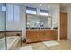 Elegant bathroom with double vanity and large mirror at 7462 E Visao Dr, Scottsdale, AZ 85266