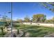 Community dog park with grassy area, and lights at 7462 E Visao Dr, Scottsdale, AZ 85266