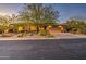 Attractive single-story home with desert landscaping and a three-car garage at 7462 E Visao Dr, Scottsdale, AZ 85266