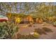 Single-story home with desert landscaping featuring cacti and agave plants at 7462 E Visao Dr, Scottsdale, AZ 85266