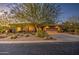 Single-story home with desert landscaping and a three-car garage at 7462 E Visao Dr, Scottsdale, AZ 85266