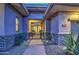 Elegant home exterior with a stone walkway and courtyard entry at 7462 E Visao Dr, Scottsdale, AZ 85266