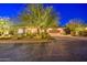 Night view of a single-story home with drought-tolerant landscaping at 7462 E Visao Dr, Scottsdale, AZ 85266