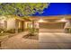 Attractive desert landscaping with stone pathway to the home entrance at 7462 E Visao Dr, Scottsdale, AZ 85266