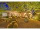 Night view of home with xeriscaping and various cacti at 7462 E Visao Dr, Scottsdale, AZ 85266