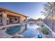 Relaxing backyard oasis with a large pool and waterfall feature at 7462 E Visao Dr, Scottsdale, AZ 85266