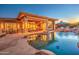 Stunning pool and patio area with lights and seating at 7462 E Visao Dr, Scottsdale, AZ 85266