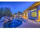 Stunning pool and spa surrounded by a flagstone patio and lush landscaping at 7462 E Visao Dr, Scottsdale, AZ 85266