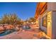 Relaxing backyard retreat with a stunning pool, spa, and fire pit at 7462 E Visao Dr, Scottsdale, AZ 85266