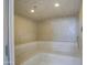 Clean and spacious sauna with tiled walls and built-in benches at 7462 E Visao Dr, Scottsdale, AZ 85266