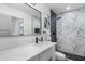 Spa-like bathroom with marble shower and modern vanity at 7749 E Coolidge St, Scottsdale, AZ 85251