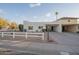 Cute single story home with white picket fence at 7749 E Coolidge St, Scottsdale, AZ 85251