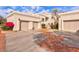 Exterior view of building, showing garage and landscaping at 7800 E Lincoln Dr # 1096, Scottsdale, AZ 85250