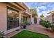 Private patio with artificial turf and brick pavers at 7800 E Lincoln Dr # 1096, Scottsdale, AZ 85250