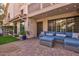 Patio with seating area, artificial turf, and brick pavers at 7800 E Lincoln Dr # 1096, Scottsdale, AZ 85250