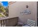 Small balcony with seating and birdhouses at 7800 E Lincoln Dr # 2092, Scottsdale, AZ 85250