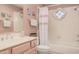 Bathroom with shower/tub combo, vanity, and window at 7800 E Lincoln Dr # 2092, Scottsdale, AZ 85250