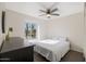 Bedroom with a queen bed and ceiling fan at 8225 N 34Th Dr, Phoenix, AZ 85051