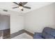 Bedroom with ceiling fan, closet and hardwood floors at 8225 N 34Th Dr, Phoenix, AZ 85051