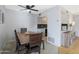 Bright dining area with a view into the kitchen at 8225 N 34Th Dr, Phoenix, AZ 85051