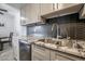 Kitchen with granite countertops and stainless steel sink at 8225 N 34Th Dr, Phoenix, AZ 85051