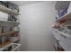 Well-organized pantry with ample shelving for storage at 8225 N 34Th Dr, Phoenix, AZ 85051