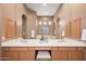 Modern bathroom with double vanity and large mirror at 8260 E Mohawk Ln, Scottsdale, AZ 85255