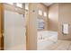 Clean bathroom with shower and bathtub at 8260 E Mohawk Ln, Scottsdale, AZ 85255