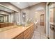 Elegant bathroom with double vanity and soaking tub at 8260 E Mohawk Ln, Scottsdale, AZ 85255