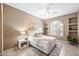 Cozy bedroom with built-in shelves and window seat at 8260 E Mohawk Ln, Scottsdale, AZ 85255