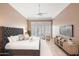 Serene bedroom with a tufted headboard and plenty of natural light at 8260 E Mohawk Ln, Scottsdale, AZ 85255