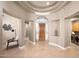 Grand entryway with high ceilings and tile flooring at 8260 E Mohawk Ln, Scottsdale, AZ 85255