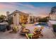 Firepit and lounge chairs around the pool at 8260 E Mohawk Ln, Scottsdale, AZ 85255