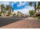 Community entrance with gated access and landscaping at 8438 N 84Th Pl, Scottsdale, AZ 85258