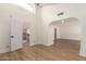 Light-filled hallway with access to spiral staircase at 8438 N 84Th Pl, Scottsdale, AZ 85258