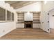 Bright living room featuring built-in shelving and fireplace at 8438 N 84Th Pl, Scottsdale, AZ 85258