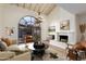 Living room boasts a fireplace and stylish furniture at 8438 N 84Th Pl, Scottsdale, AZ 85258