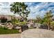 Peaceful pond with a wooden table and chairs at 8438 N 84Th Pl, Scottsdale, AZ 85258