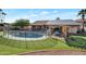 Backyard oasis with a sparkling pool and pergola at 859 N 54Th Cir, Mesa, AZ 85205