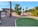 Backyard with shed, trees, and artificial turf at 859 N 54Th Cir, Mesa, AZ 85205