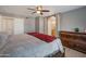 Main bedroom with ensuite bathroom access and ceiling fan at 859 N 54Th Cir, Mesa, AZ 85205