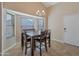 Bright dining area with a table and chairs, perfect for Gathering meals at 859 N 54Th Cir, Mesa, AZ 85205