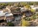 Aerial view highlighting the home's backyard patio and landscaping at 9270 E Thompson Peak Pkwy # 335, Scottsdale, AZ 85255