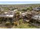 Aerial view of home and surrounding community with desert landscape at 9270 E Thompson Peak Pkwy # 335, Scottsdale, AZ 85255