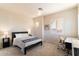 Bedroom with built-in workspace and window shutters at 9270 E Thompson Peak Pkwy # 335, Scottsdale, AZ 85255