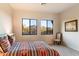 Bedroom with mountain views and a southwestern style at 9270 E Thompson Peak Pkwy # 335, Scottsdale, AZ 85255