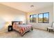 Bright bedroom with mountain views and southwest decor at 9270 E Thompson Peak Pkwy # 335, Scottsdale, AZ 85255