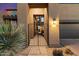 Elegant entryway with iron gate leading to a private courtyard at 9270 E Thompson Peak Pkwy # 335, Scottsdale, AZ 85255